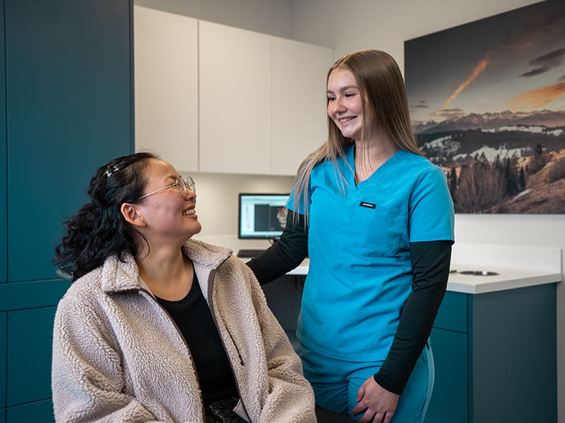 A patient talking to a team member