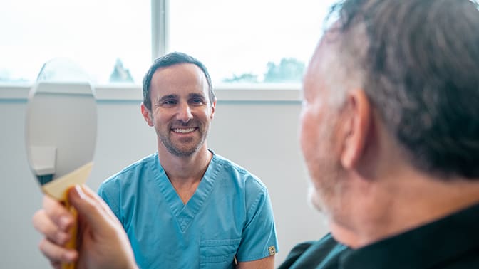 Dr. Epstein speaking with a patient