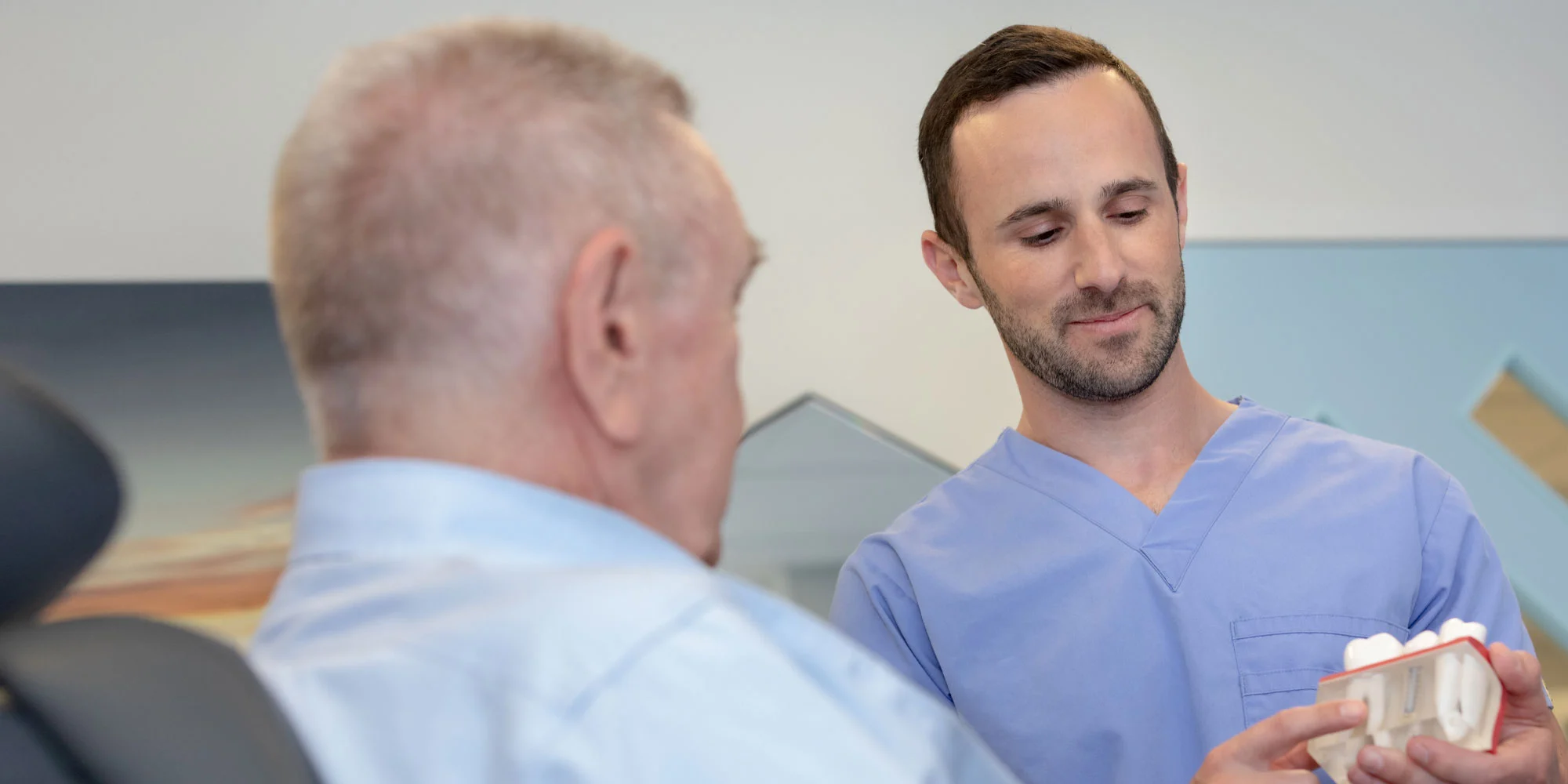 dr epstein discussing dental implants procedure seattle wa