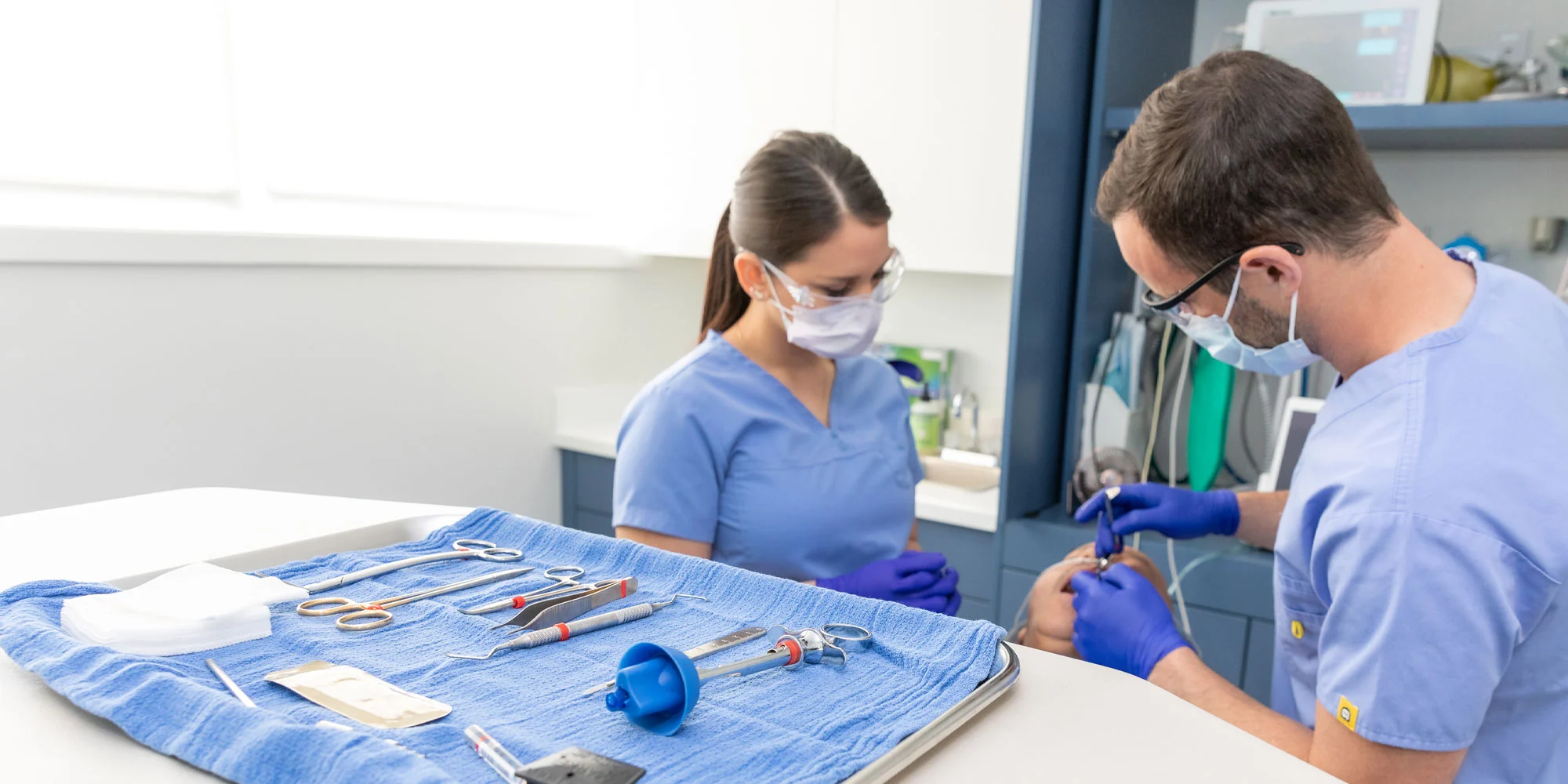 dr epstein performing wisdom teeth extraction procedure seattle wa